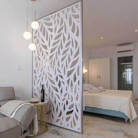 Dionisos Suites Ліксурі Екстер'єр фото